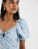 Vero Moda puff sleeve tie front detail maxi dress in blue floral print